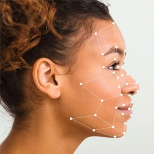 Woman with face being scanned